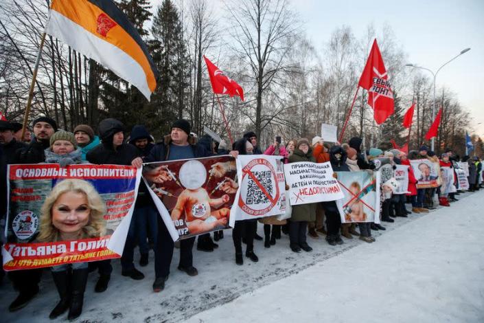 FILE PHOTO: People protest against COVID-19 vaccination and QR codes proving immunity status, in Yekaterinburg