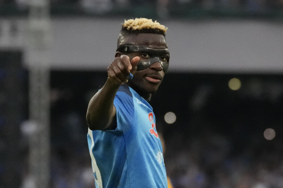 Napoli's Victor Osimhen celebrates after scoring during the Serie A soccer match between Napoli and Sampdoria at the Diego Maradona Stadium, in Naples, Sunday, June 4, 2023. (AP Photo/Andrew Medichini)