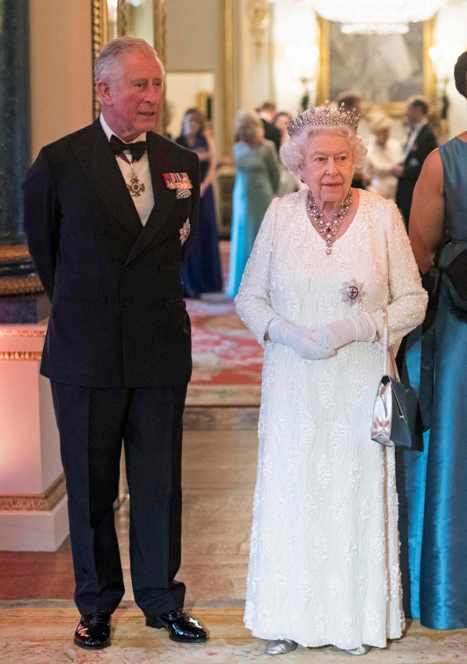 Queen Elizabeth II and Prince Charles, Prince of Wales in the Blue Drawing Room at The Queen's Dinner,  2018 (Getty Images)