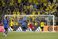CF Montréal forward Jules-Anthony Vilsaint, center left,shoots against Columbus Crew goalkeeper Patrick Schulte, center right, during the second half of an MLS soccer match Saturday, April 27, 2024, in Columbus, Ohio. (AP Photo/Jeff Dean)