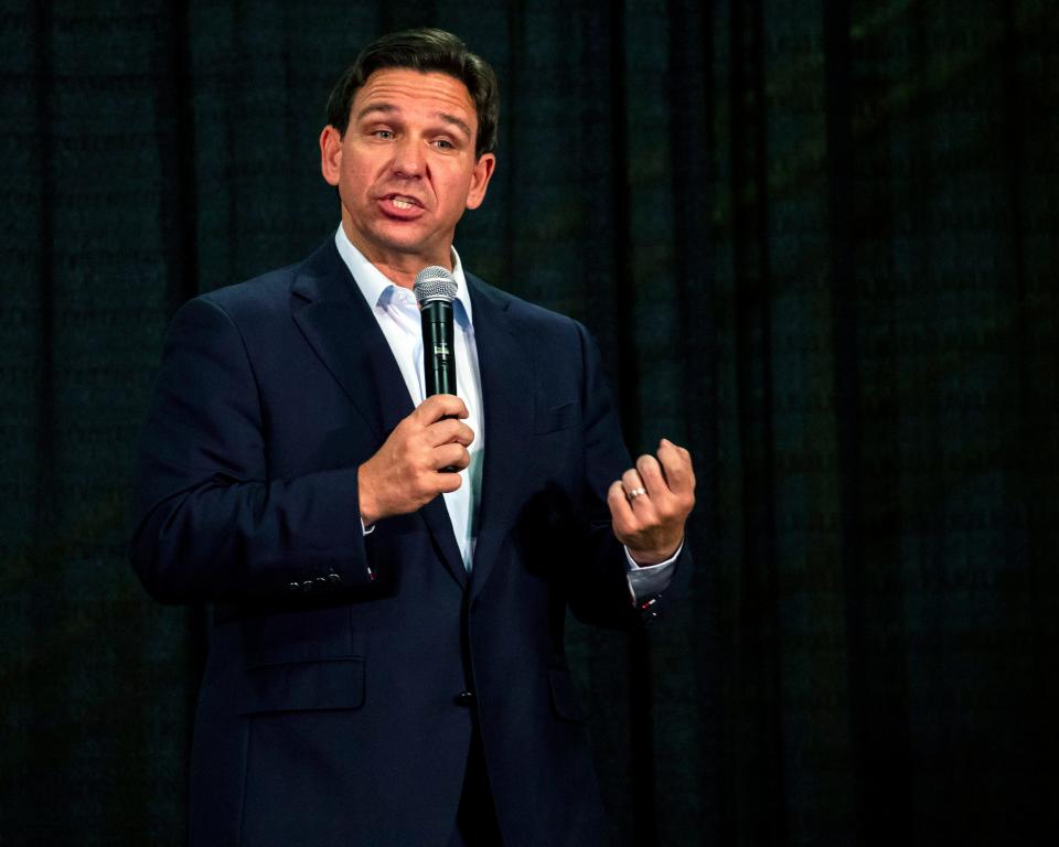 Florida Gov. Ron DeSantis speaks during U.S. Rep. Mariannette Miller-Meeks', R-Iowa, Triple MMM Tailgate event in Iowa City, Iowa on Friday, Oct. 20, 2023. The event featured remarks from several candidates for the Republican Party's nomination for President. (Nick Rohlman/The Gazette via AP)