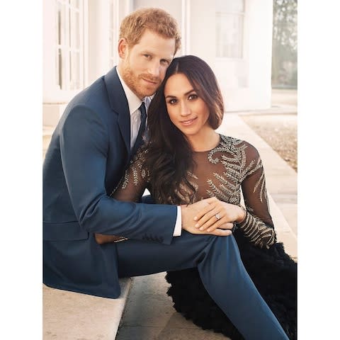The Royal engagement photo that prompted Samantha Markles Twitter barb about Ms Markle's dress - Credit: PA