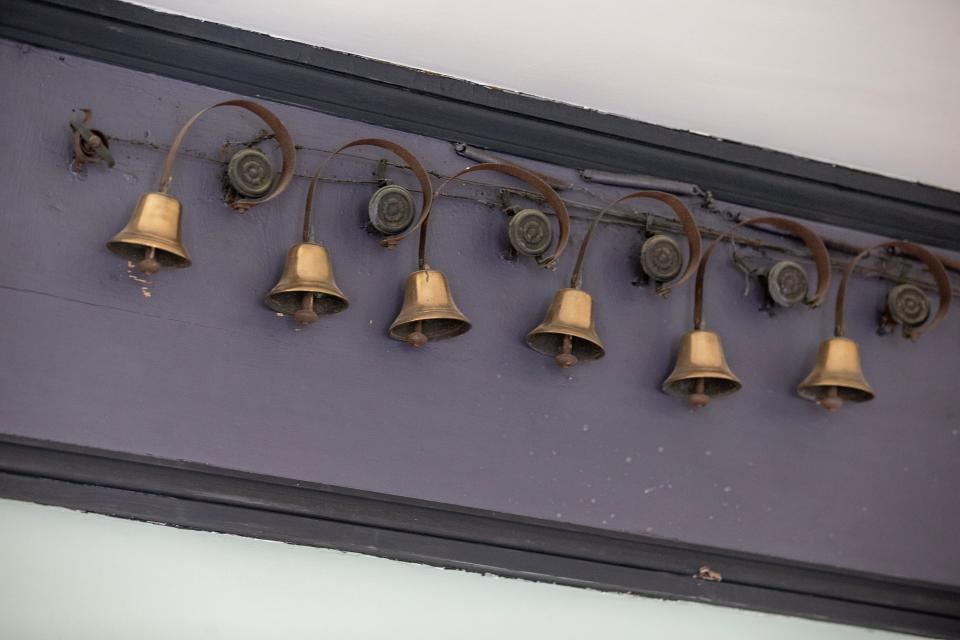 Bells in the servants quarters of the Taylor-Butler House, built in 1853 in Middletown, which were once wired to different rooms in the house where the homeowner could ring for assistance. Sydney Fernandez, marketing and development associate of the Monmouth County Historical Association, said she heard bells ringing during a recent paranormal investigation of the house. Middletown, NJ Tuesday, March 12, 2024.