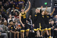 Iowa center Luka Garza (55) gestures after a 3-point basket against Northwestern during the second half of an NCAA college basketball game Tuesday, Jan. 14, 2020, in Evanston, Ill. (AP Photo/David Banks)