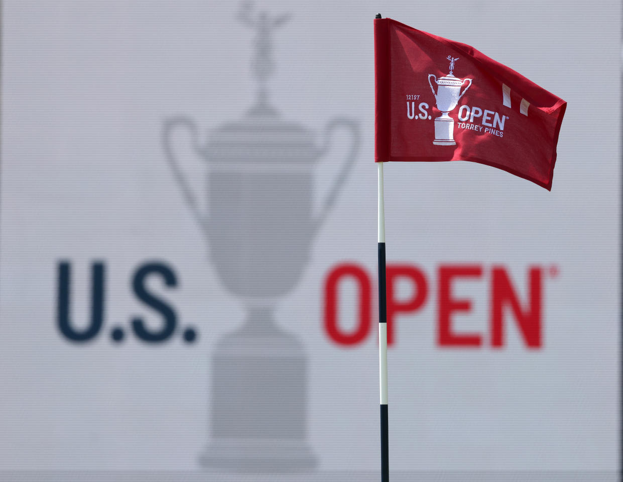 SAN DIEGO, CALIFORNIA - JUNE 15: A general view of a flag and signage is seen on the 17th green during a practice round prior to the start of the 2021 U.S. Open at Torrey Pines Golf Course on June 15, 2021 in San Diego, California. (Photo by Harry How/Getty Images)