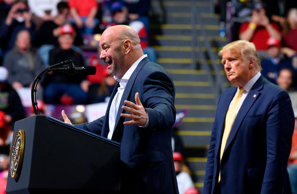 While Donald Trump watches, UFC chief executive Dana White addresses a February 2020 rally in Colorado Springs, Colorado.