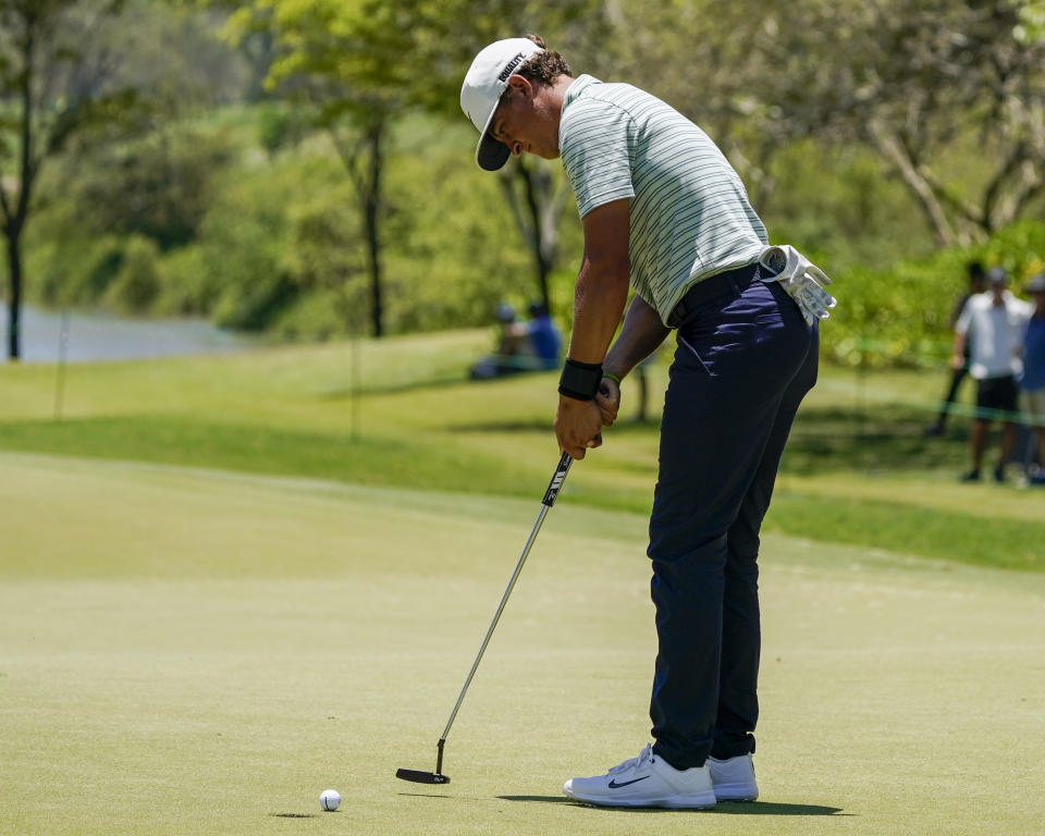 Cameron Champ, of the United States, putts on the sixth hole during the third round of the Mexico Open at Vidanta in Puerto Vallarta, Mexico, Saturday, April 30, 2022. (AP Photo/Eduardo Verdugo)