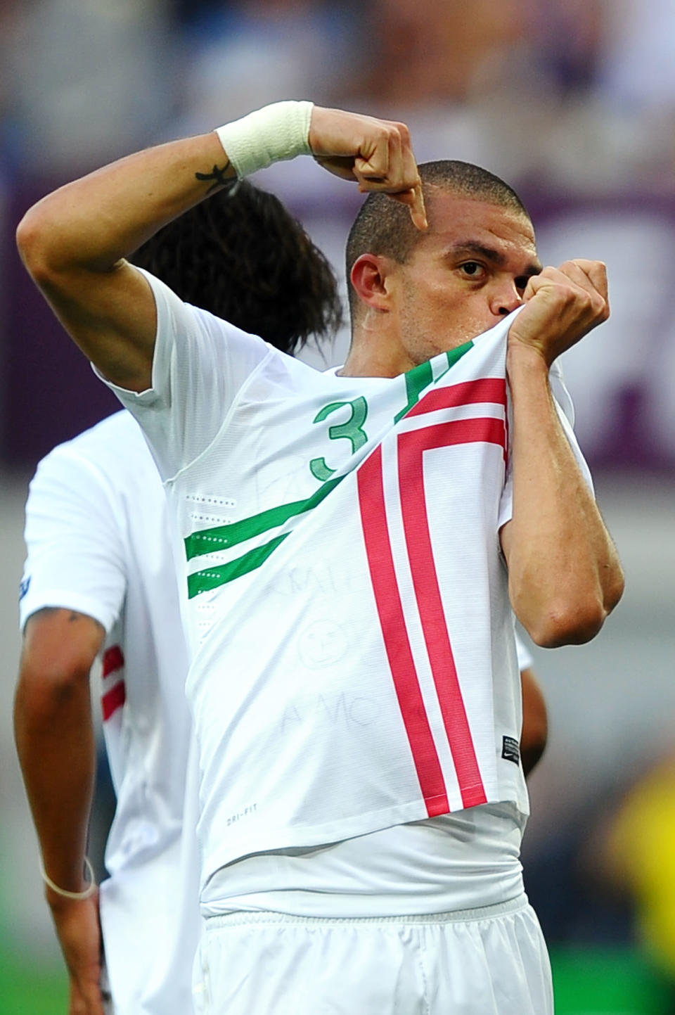 L'VIV, UKRAINE - JUNE 13: Pepe of Portugal celebrates scoring their first goal during the UEFA EURO 2012 group B match between Denmark and Portugal at Arena Lviv on June 13, 2012 in L'viv, Ukraine. (Photo by Laurence Griffiths/Getty Images)