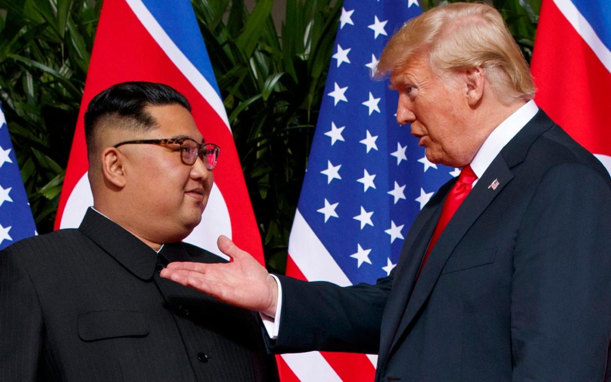 Kim Jong-un and President Trump met for the first time in Singapore last June - AP