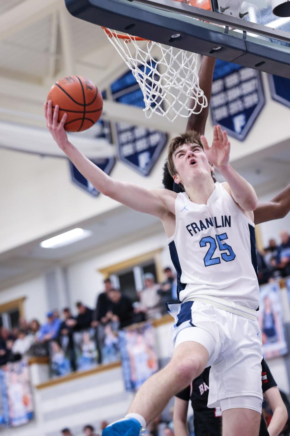 Franklin junior Sean O'Leary shoots for two points during the Division 1 Round of 16 MIAA tournament game against Brockton at Franklin High School on Mar. 07, 2023.