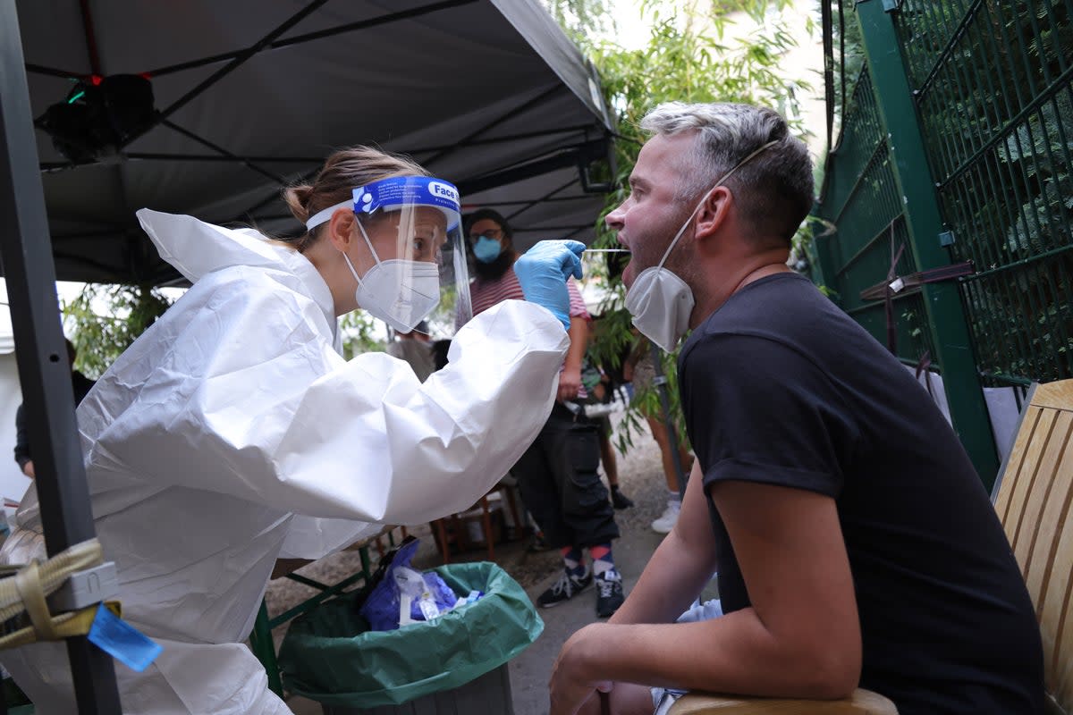 A file picture of participant taking an express PCR test for Covid-19 in Berlin  (Getty Images)