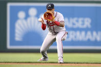 Atlanta Braves second baseman Orlando Arcia fields a grounder by Washington Nationals' Nelson Cruz during the first inning of a baseball game, Wednesday, June 15, 2022, in Washington. Cruz was out at first on the play. (AP Photo/Nick Wass)