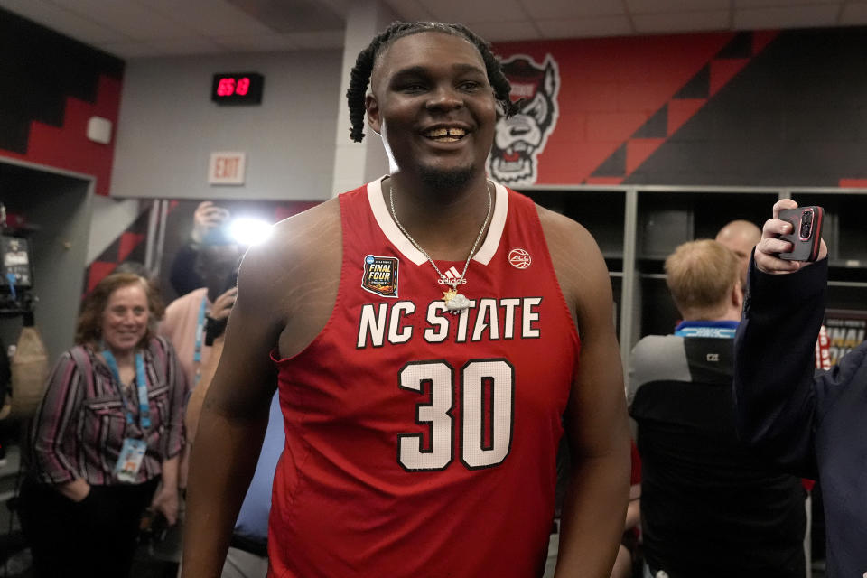 NC State forward DJ Burns Jr. speaks with reporters ahead of a Final Four college basketball game in the NCAA Tournament, Thursday, April 4, 2024, in Glendale, Ariz. NC State plays Purdue on Saturday. (AP Photo/Brynn Anderson )