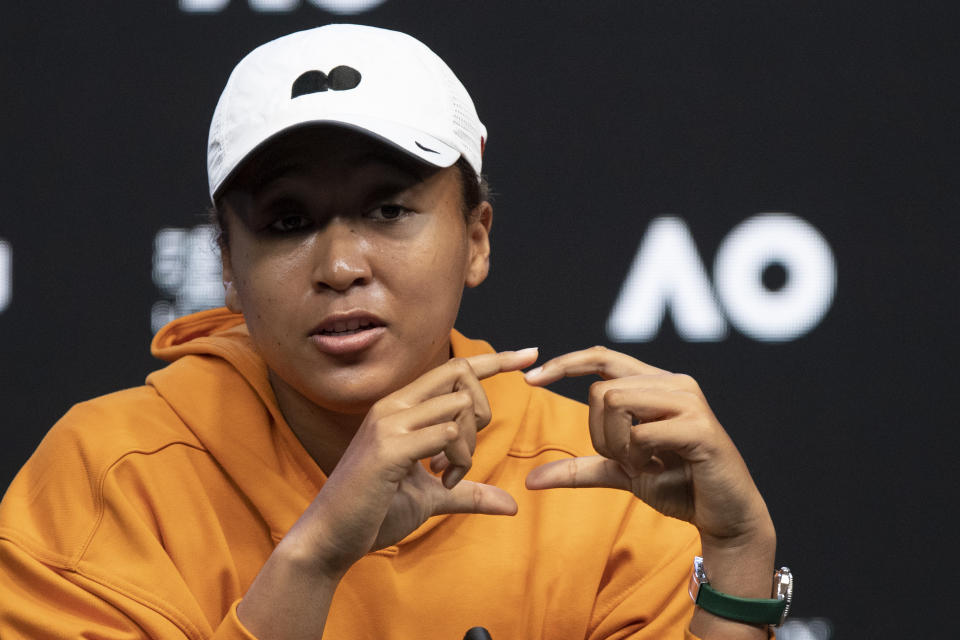 Japan's Naomi Osaka gestures during a press conference ahead of the Australian Open tennis championships in Melbourne, Australia, Saturday, Jan. 15, 2022. (AP Photo/Simon Baker)