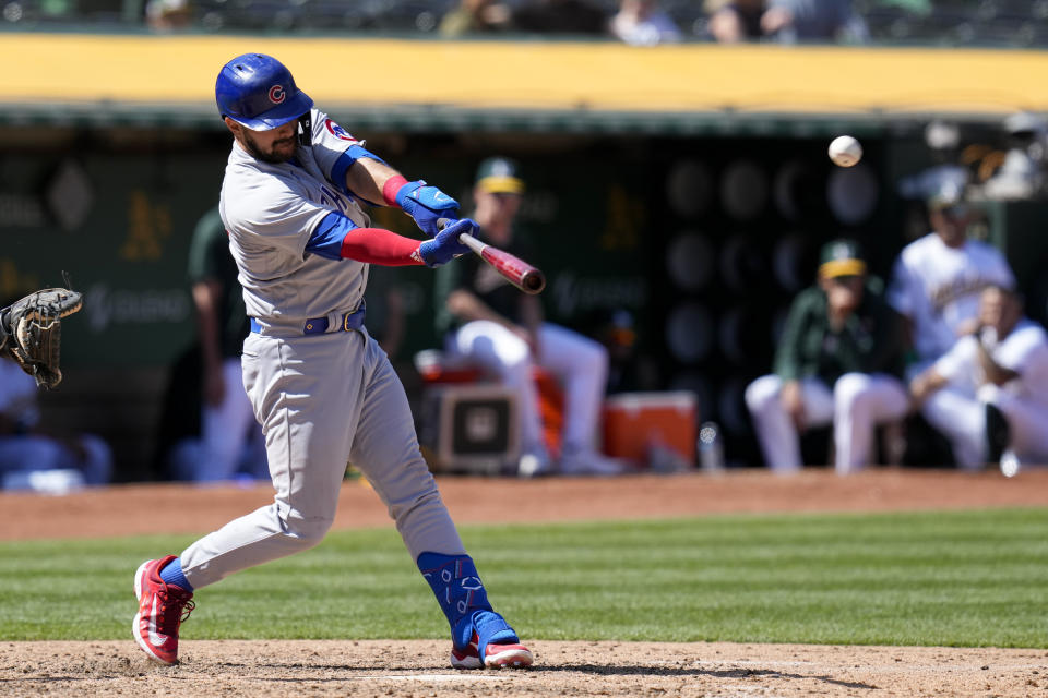 Chicago Cubs' Luis Torrens hits a three-run double against the Oakland Athletics during the ninth inning of a baseball game in Oakland, Calif., Wednesday, April 19, 2023. (AP Photo/Godofredo A. Vásquez)