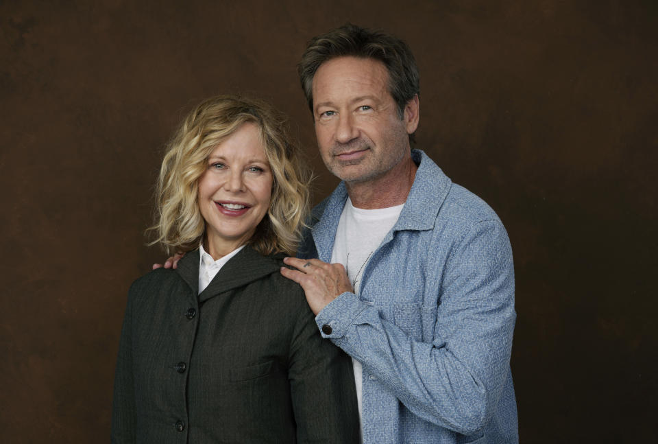 Actor-director Meg Ryan, left, poses with co-star David Duchovny at the Four Seasons Hotel in Los Angeles on Wednesday, Oct. 25, 2023, to promote their film "What Happens Later." (AP Photo/Chris Pizzello)