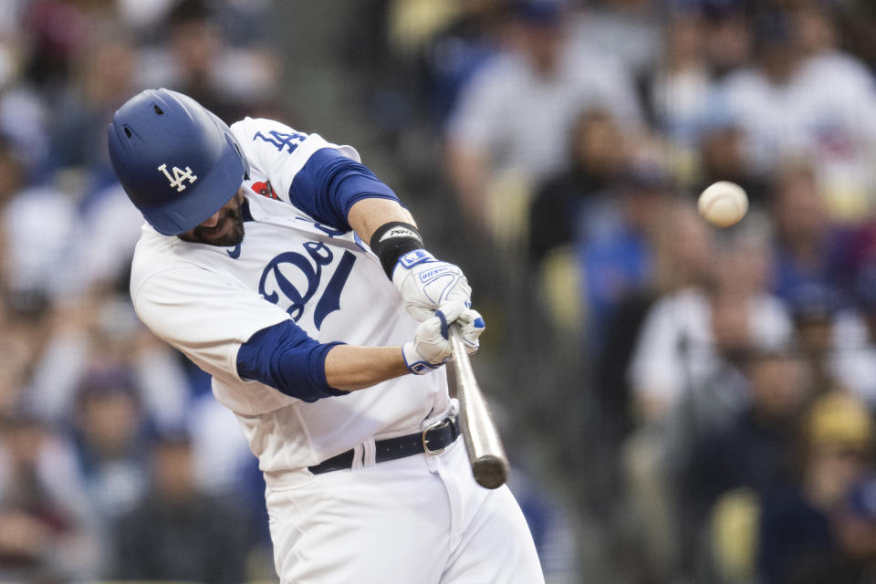 Los Angeles Dodgers designated hitter J.D. Martinez (28) hits a three-run home run during the fifth inning of a baseball game against the Washington Nationals in Los Angeles, Monday, May 29, 2023. (AP Photo/Kyusung Gong)