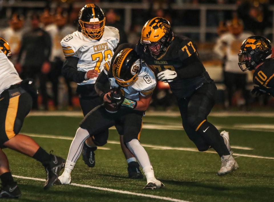 Joseph Natzel, 77, of Yucca Valley sacks quarterback Andrew Lopez, 8, during their CIF win over Santa Fe in Yucca Valley, Calif., Nov. 17, 2023.