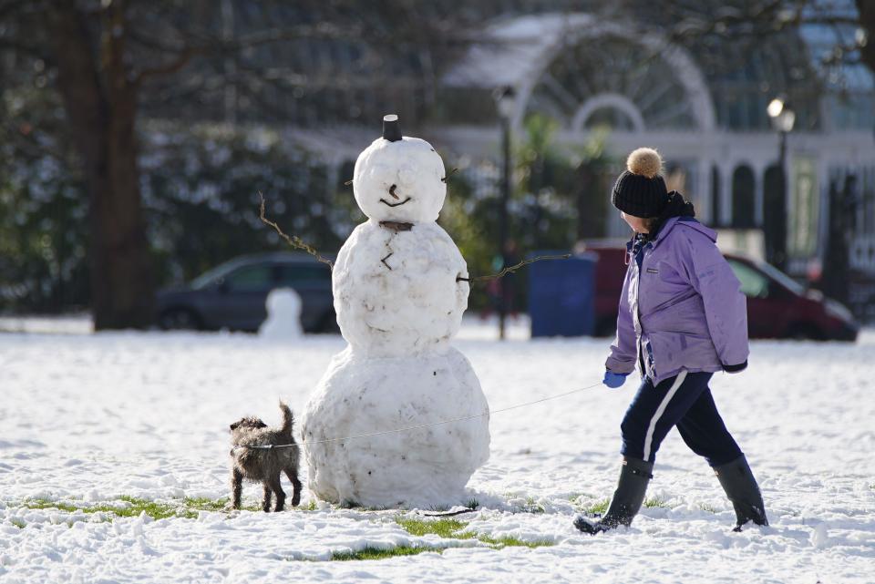 A snowman in Sefton Park, Liverpool. Much of Britain is facing another day of cold temperatures and travel disruption after overnight lows dropped below freezing for the bulk of the country. A 