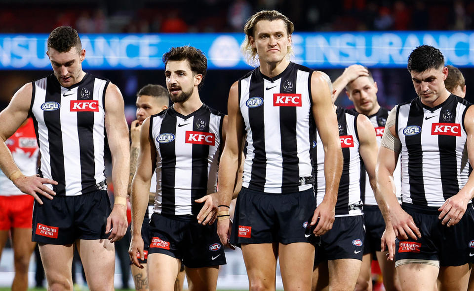 Collingwood players, pictured here after their loss to Sydney.