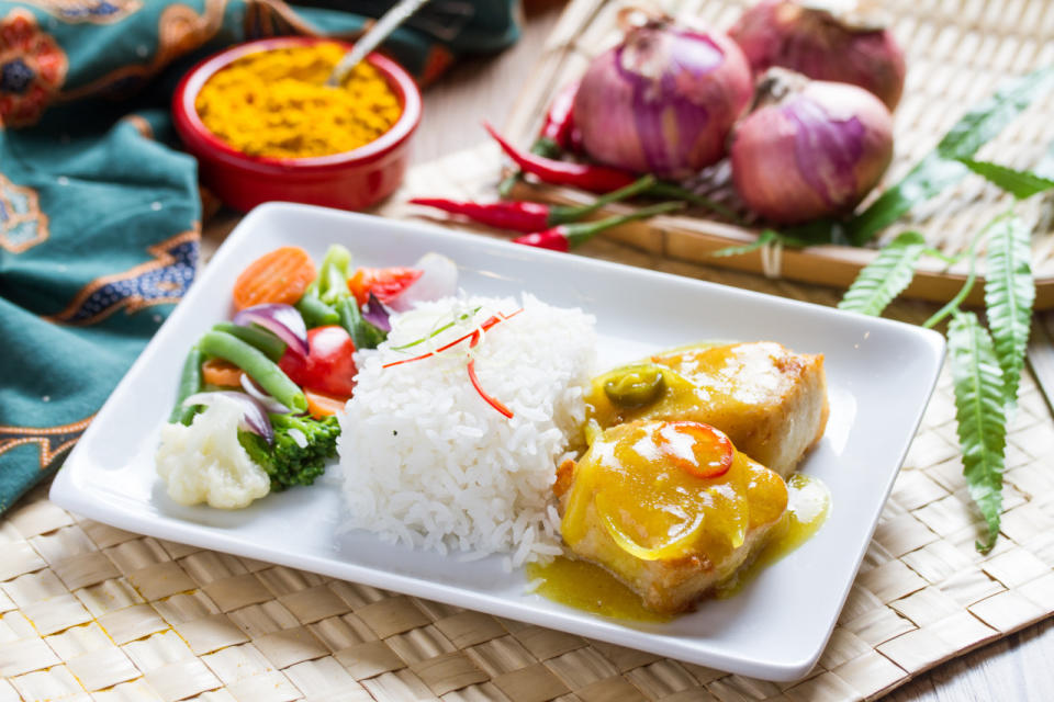 Ikan assam (spiced fish) with steamed rice and mixed vegetables