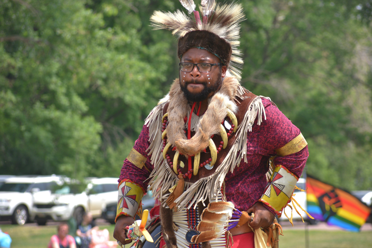 Ronald Blackman, 29, dances in Native American regalia during the Sioux Falls Two Spirit Wacipi on Saturday, June 17, 2023.