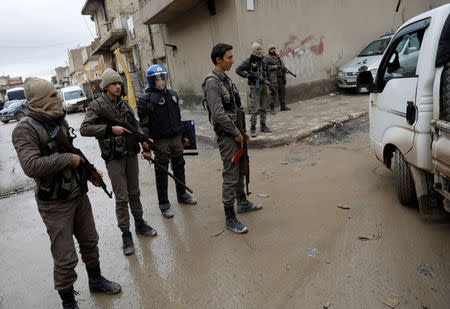 Members of Turkey-backed Free Syrian Army police forces patrol in Azaz, Syria January 26, 2018. REUTERS/Umit Bektas