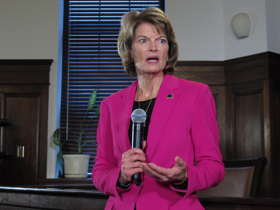 FILE - In this Feb. 18, 2020, photo, U.S. Sen. Lisa Murkowski speaks with reporters in Juneau, Alaska. The leaders of Alaska's Republican Party on Saturday, July 10, 2021 endorsed a challenger to incumbent U.S. Sen. Lisa Murkowski, who has been one of the GOP's most outspoken critics of former President Donald Trump, the Anchorage Daily News reported. The Alaska Republican State Central Committee endorsed Kelly Tshibaka in the 2022 race for the U.S. Senate seat held by Murkowski. (AP Photo/Becky Bohrer, File)