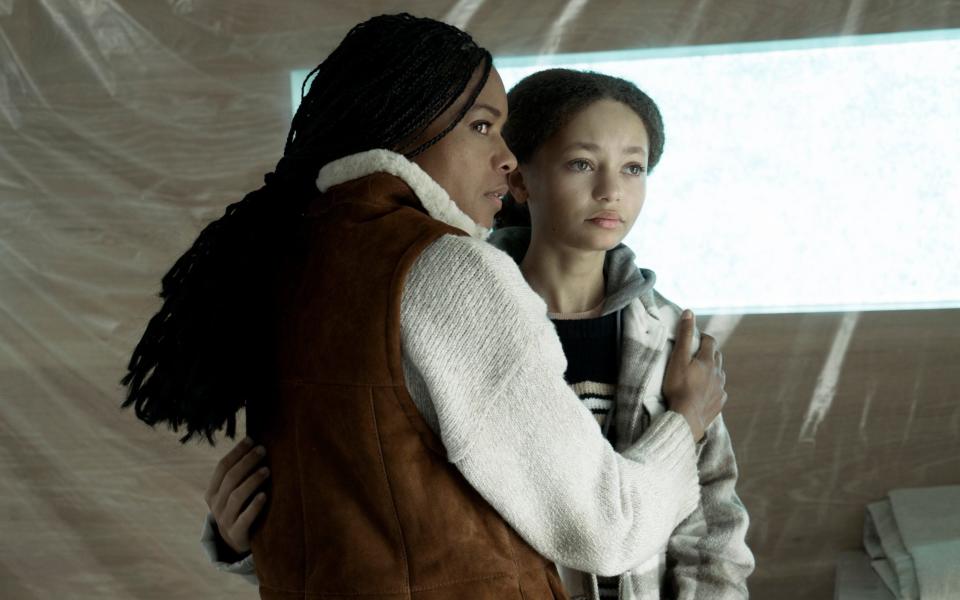 Helen (Naomie Harris) attempts to protect her daughter, Ellie (Nico Parker), from the mysterious Oseans - HBO/Sky UK