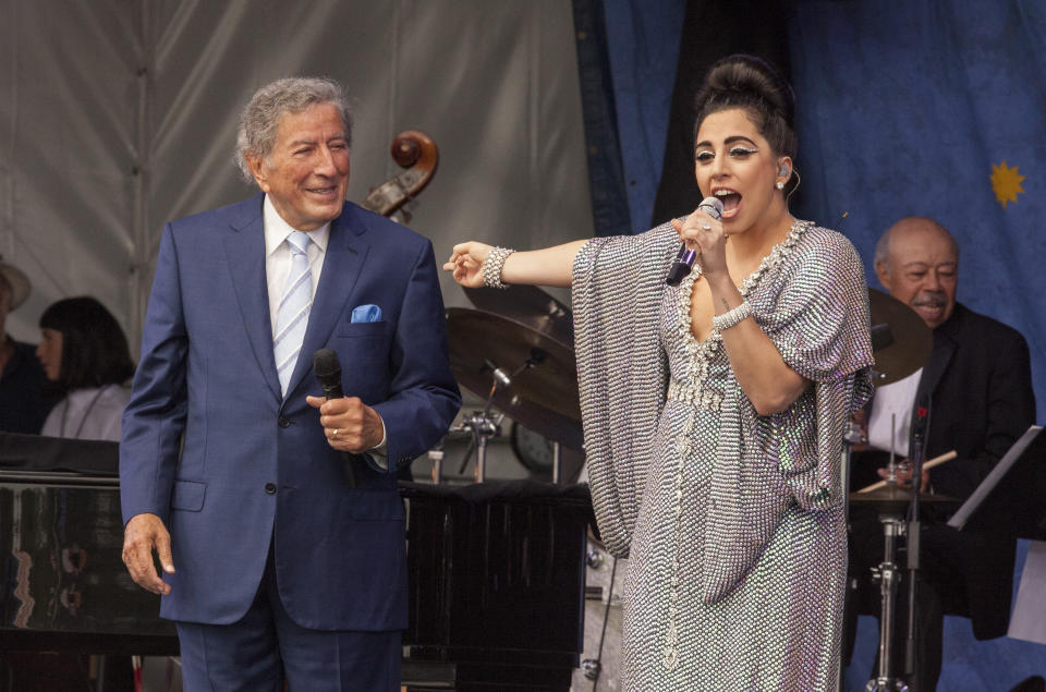 FILE - Tony Bennett, left, and Lady Gaga perform at the New Orleans Jazz & Heritage Festival, on April 26, 2015 in New Orleans. Bennett died Friday, July 21, 2023. at age 96. (Photo by Barry Brecheisen/Invision/AP, File)