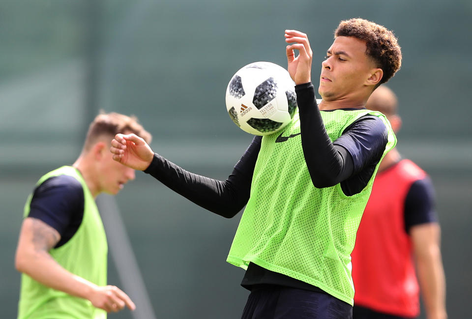  Spurs midfield man Dele Alli controls the ball on his chest during the first training session. (Getty)