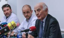 Jean-Francois Payen (C), head anaesthetician at the CHU hospital, neurosurgeon Stephan Chabardes (L) and Professor Gerard Saillant (R), President of the Institute for Brain and Spinal Cord Disorders (ICM), attend a news conference at the CHU Nord hospital emergency unit in Grenoble, French Alps, where retired seven-times Formula One world champion Michael Schumacher is hospitalized after a ski accident, December 30, 2013. Former Formula One champion Michael Schumacher was battling for his life in hospital on Monday after a ski injury, doctors said, adding it was too early to say whether he would pull through. Schumacher was admitted to hospital on Sunday suffering head injuries in an off-piste skiing accident in the French Alps resort of Meribel. (REUTERS/Robert Pratta)
