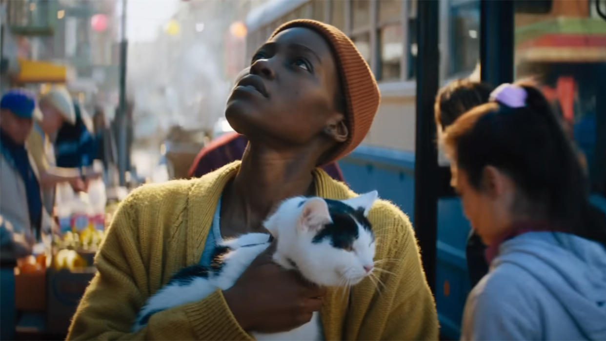  Lupita Nyong'o with her cat on Day 1. 