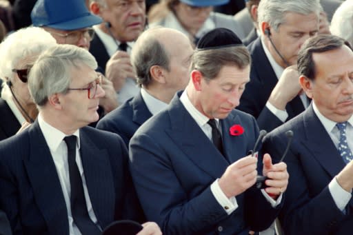 Prince William's father Prince Charles (C) and then-British prime minister John Major (L) attend the funeral of late Israeli prime minister Yitzhak Rabin at the Jerusalem Mount Herzl military cemetery on November 6, 1995