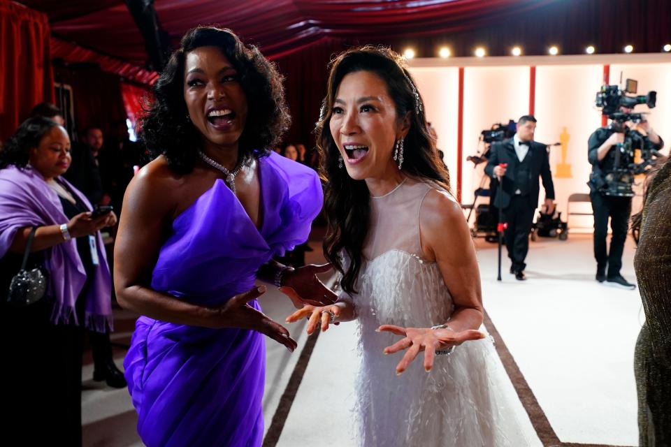 Nominees Angela Bassett, left, and Michelle Yeoh arrive at the 95th Academy Awards in 2023.