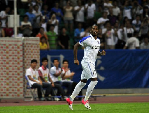 Shanghai Shenhua's Didier Drogba during their match against Guangzhou R&F on July 22. Drogba made an instant impact on his debut for the Chinese Super League side, setting up his new team's equaliser in a 1-1 draw away to Guangzhou R&F