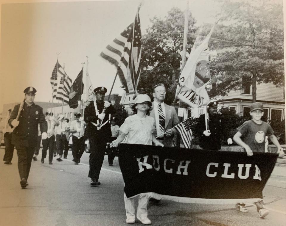 Then Quincy Parks Department Director Richard Koch marches with the Koch Club in the Quincy Flag Day Parade in the 1970s.