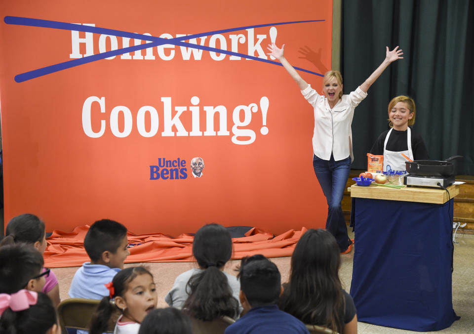 In August, Anna Faris surprised one of the 12 schools that initiated Uncle Ben’s “homework pass kit” program and told the kids they didn’t have to do homework for one week. (Photo: Michael Kovac / Getty Images)