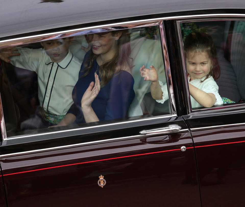 WINDSOR, ENGLAND - OCTOBER 12: Page boy Prince George of Cambridge and bridesmaids Lady Louise Windsor and Princess Charlotte of Cambridge arrive ahead of the wedding of Princess Eugenie of York and Mr. Jack Brooksbank at St. George's Chapel on October 12, 2018 in Windsor, England. (Photo by Aaron Chown - WPA Pool/Getty Images)