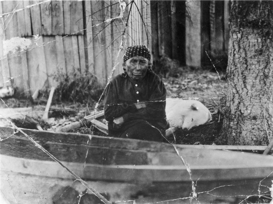 Mary Adams and Jumbo, one of the last woolly dogs, circa 1912.