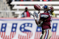 FILE - Michigan Panthers wide receiver Joe Walker (8) receives a punt during the second half of a USFL football game against the Houston Gamblers Sunday, April 17, 2022, in Birmingham, Ala. A revived United States Football League — borrowing the moniker and team nicknames from a league that went out of business 36 years ago — launched last month with all regular-season games being played in Birmingham, Alabama. (AP Photo/Butch Dill, File)