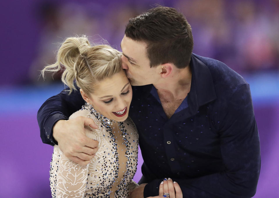 Alexa Scimeca Knierim and Chris Knierim of the USA embrace after their performance in the pair figure skating short program in the Gangneung Ice Arena at the 2018 Winter Olympics in Gangneung, South Korea, Wednesday, Feb. 14, 2018. (AP Photo/Bernat Armangue)