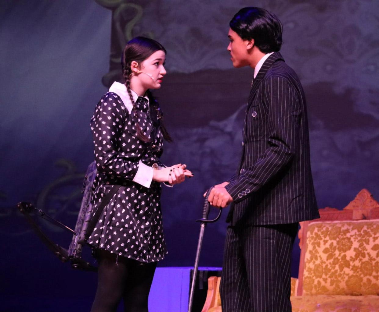 Evy Runyon (Wednesday Addams) and Noah Williams (Gomez Addams) rehearse a scene for this weekend's production of "The Addams Family Musical."