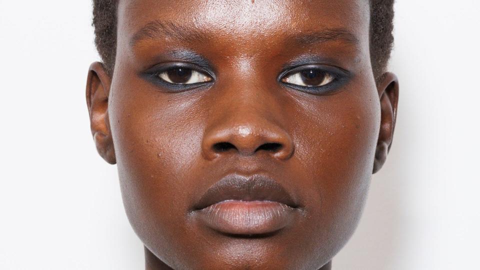 A model poses backstage ahead of the Sportmax fashion show during the Milan Fashion Week