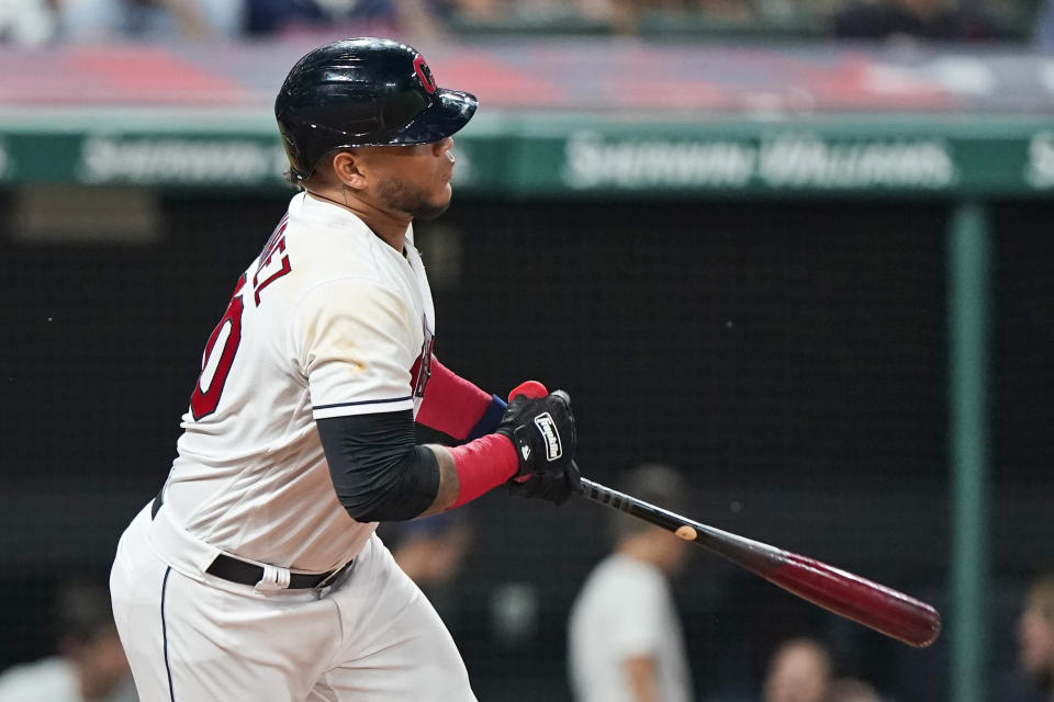 Cleveland Indians' Harold Ramirez watches his RBI single during the sixth inning of the team's baseball game against the Seattle Mariners, Friday, June 11, 2021, in Cleveland. (AP Photo/Tony Dejak)