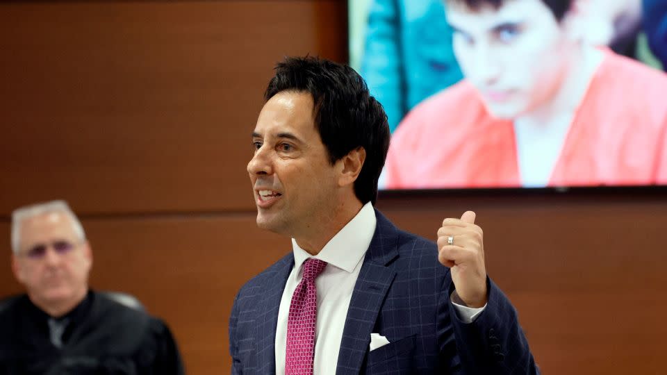 Defense attorney Mark Eiglarsh points at a photo of the Marjory Stoneman Douglas High School shooter during his closing argument in the trial of his client, Scot Peterson, on Monday. - Amy Beth Bennett/Pool/South Florida Sun-Sentonel/AP