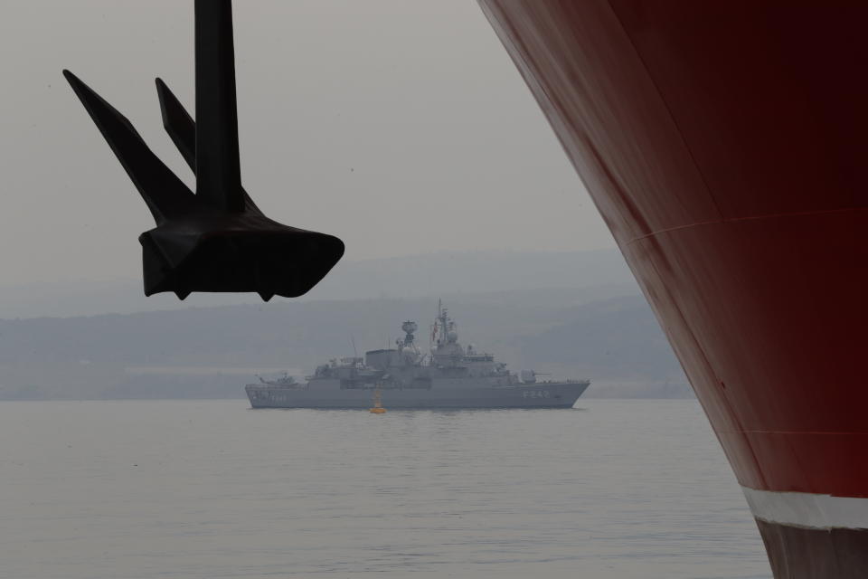 A Turkish Navy vessel patrols as the drilling ship 'Yavuz' scheduled to be dispatched to the Mediterranean, is docked at the port of Dilovasi, outside Istanbul,Thursday, June 20, 2019. Turkey is launching a second drillship that it says will drill for gas off neighbouring Cyprus despite European Union warnings to refrain from such illegal actions that could incur sanctions against Ankara. (AP Photo/Lefteris Pitarakis)
