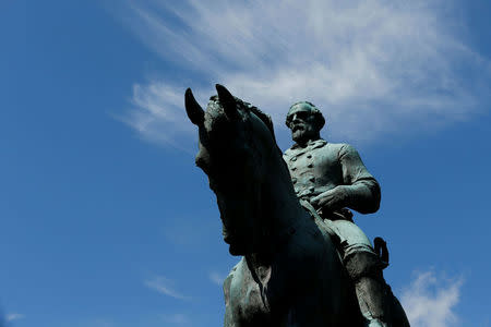 The statue of Confederate General Robert E. Lee sits at the center of the park formerly dedicated to him, the site of recent violent demonstrations in Charlottesville, Virginia, U.S. August 18, 2017. REUTERS/Jonathan Ernst