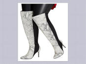 <p>Tall mixed faux snakeskin boots, $54, <a rel="nofollow noopener" href="http://www.ashleystewart.com/tall-mixed-snakeskin-boots---wide-width%2C-wide-calf/402009974373.html#start=2&cgid=shoes_accessories" target="_blank" data-ylk="slk:Ashley Stewart;elm:context_link;itc:0;sec:content-canvas" class="link ">Ashley Stewart</a> (Photo: Ashley Stewart) </p>