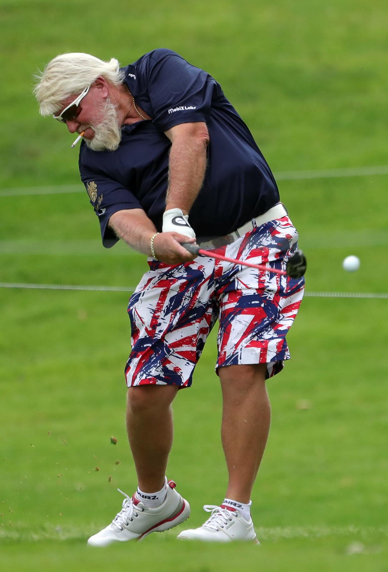 John Daly sends his ball down the No. 7 fairway during the Bridgestone Senior Players Pro-Am at Firestone Country Club on Wednesday, June 23, 2021, in Akron, Ohio.
